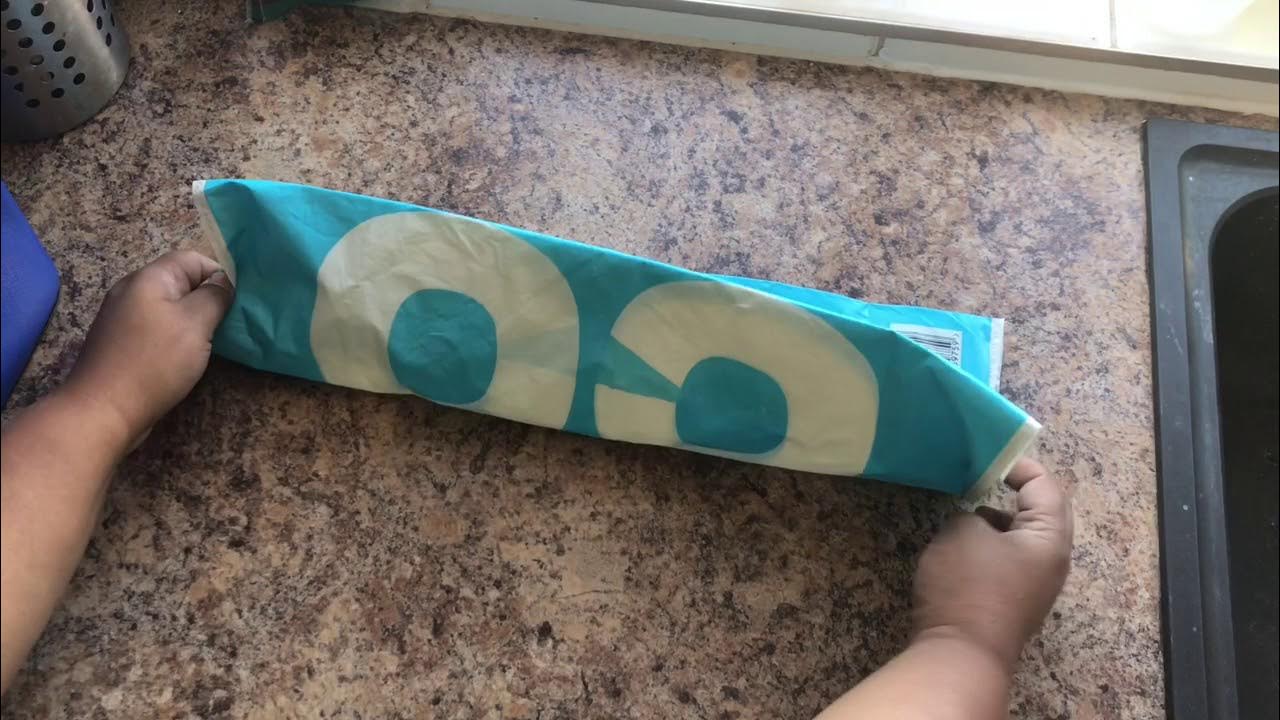 How to fold a carrier bag for easy storage YouTube