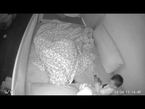 Baby Monitor Captures: Refusing to nap but sits on Mom's face instead