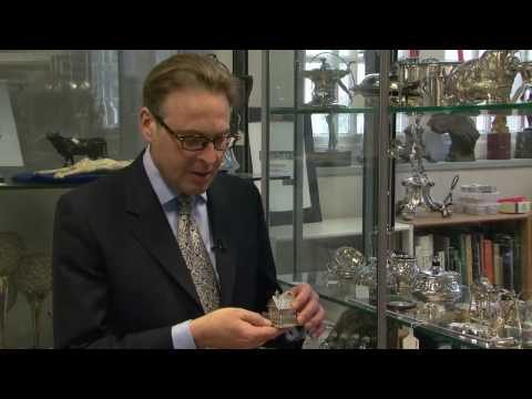 Looking at antique silver trinkets