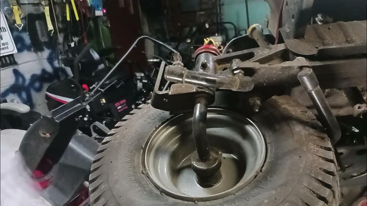 how to change the steering rods out on a Craftsman riding lawn mower YT