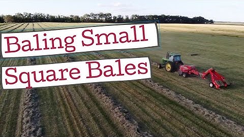 BALING A GRASS/ALFALFA FIELD IN TO SMALL SQUARE BALES / / DGI MAVIC AIR DRONE