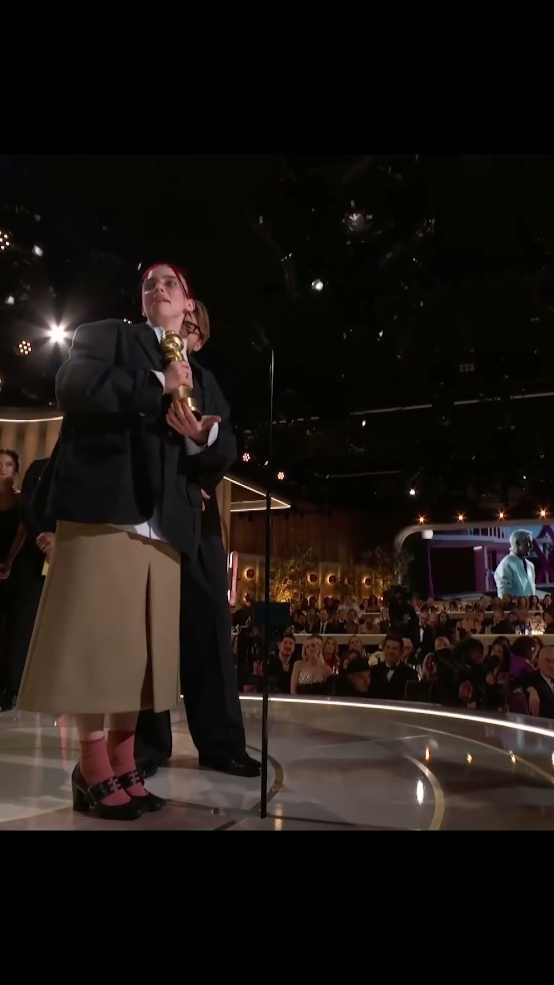 Billie and Finneas accepting the Golden Globe for Best Original Song for Motion Picture