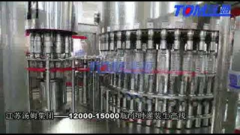 Máy chiết rót và đóng nắp dầu ăn dạng xoay. www.abmvietnam.com