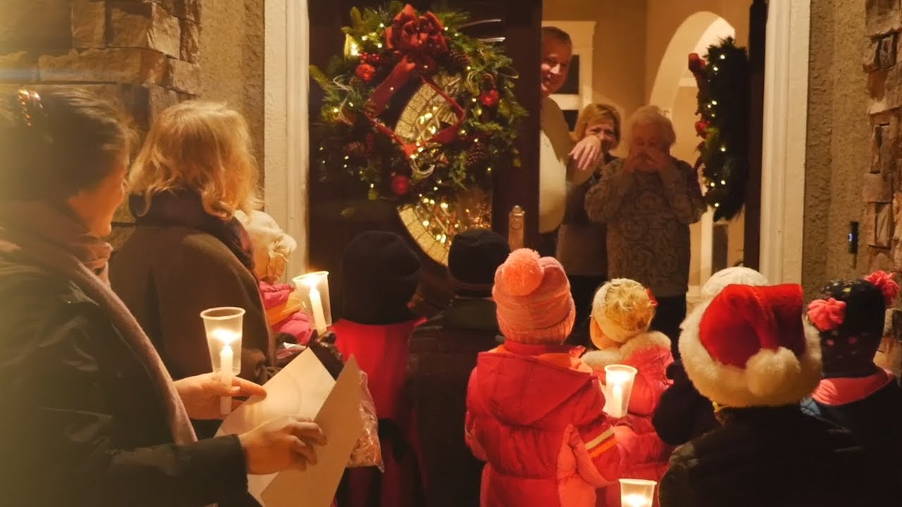Candlelight Christmas Carolers bring tears to Grandmother's Eyes