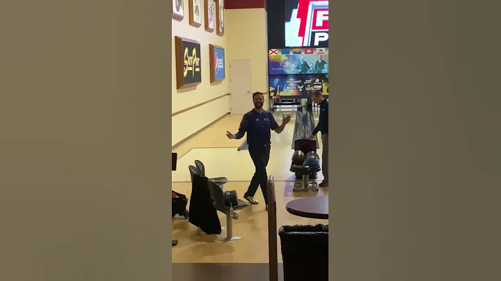 Jason Belmonte bowling from the approach with plas...
