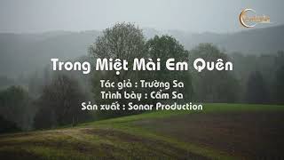 Trong miệt mài em quên