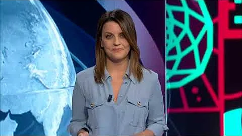 Isabella Romano in sky blue blouse with pockets