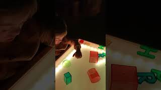 Rainbow light table. preschooler exploring shapes and letters #preschoolactivities #specialneeds