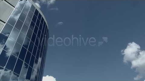 Mirrored Building and Clouds Timelapse (Stock Footage)