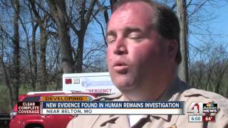 Investigators search area where human remains were found