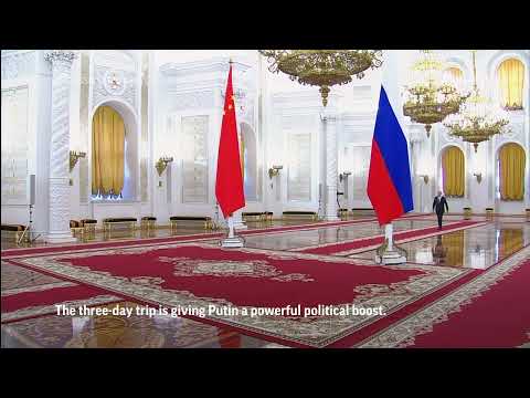 Putin welcomes Xi