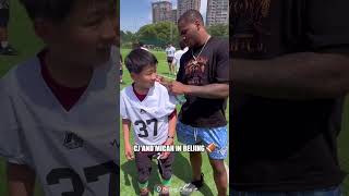 C.J. Stroud and Micah Parson teaching Football in China ??