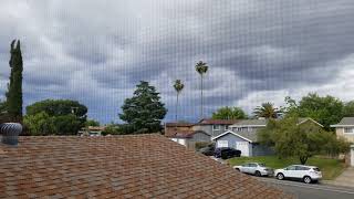 Mostly Cloudy Dark Clouds and Windy WSW and West Winds 5:30pm May 21, 2019