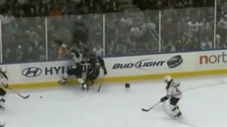 Joe Corvo hipchecks Corey Tropp
