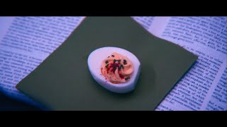 irving loses his religion - deviled egg in the sacred compliance handbook - Severance