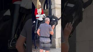 Tourist Pets the King’s Horse