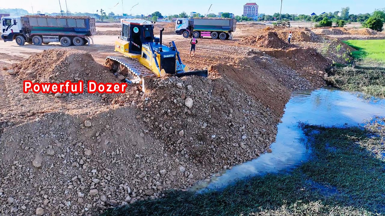 Great work! Nice bulldozer operator pushed soil filling over water to fill the pond