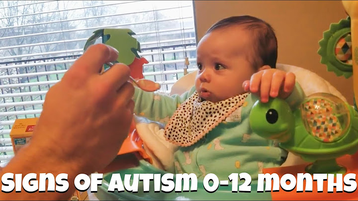 What are the first signs of autism in a baby?