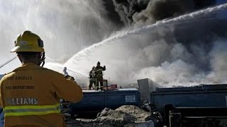Junkyard fire sends smoke plume over San Fernando Valley