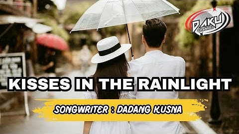 Thumbnail of Kisses in the Rainlight – Official Lyric Video | Romantic Indie Love Song @DakuChannel0202