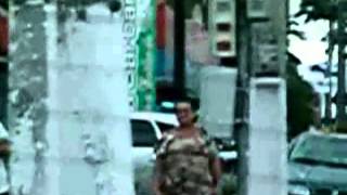 Brazil woman lak amputee crutching on the street