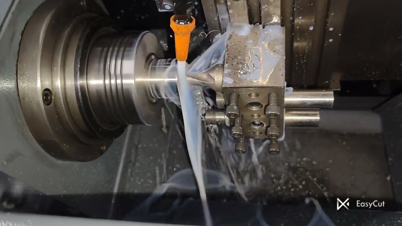 A 42 CNC Machine with Servo spindle.Operation Turing,OD&ID threading,  Drilling,Taping,Boring.