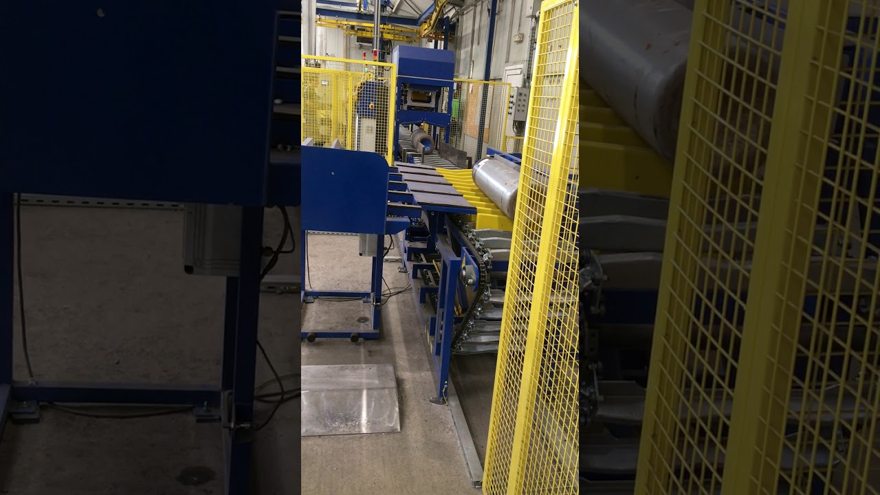0020 Gas cylinder automatic loading on a conveyor line