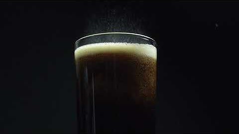 Dropping Ice in Coke Slow Motion