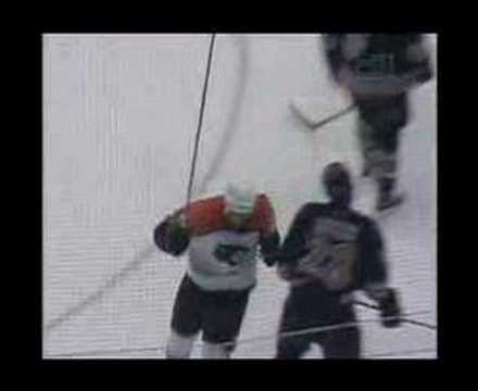 Kyle Calder scores his second goal of the game aga...