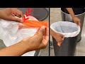 How to place a trash bag in a trash can so it wont fall