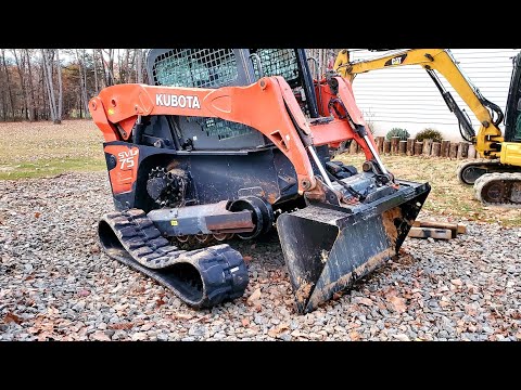 Skid Steer new Tracks, Undercarriage, and Rock Grapple - YouTube
