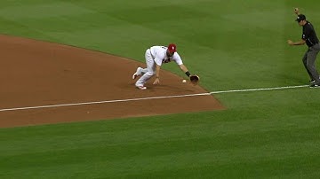 Adams makes diving stop, prevents a run