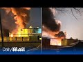 Ukraine combat drones attack and set ablaze Russian oil depot in Luhansk