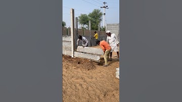 In precast boundary wall, fins are installed in the columns by laborers in this manner #Precast