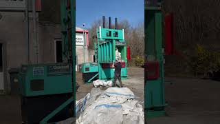 MONSTER BALER EATS UP TON BAGS