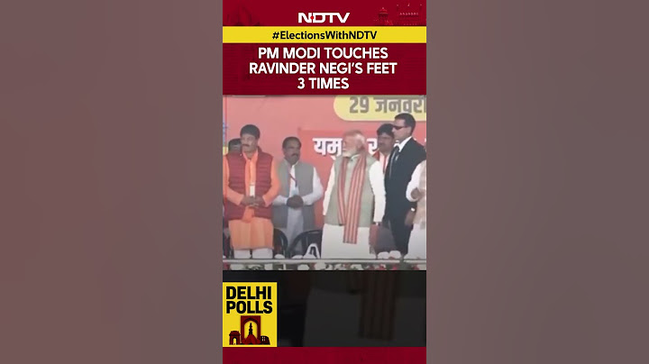 Delhi Elections 2025 | PM Modi Touches Patparganj Candidate Ravinder Negi's Feet 3 Times