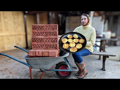 Village life. Woman is cooking her best potato pancakes. Mountain dried mushrooms for Amazing soup