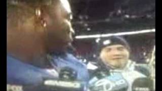 justin tuck interview with creepy guy behind him
