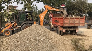 Case Backhoe Loader Loading Ballast On Tipper - Case Backhoe Video
