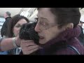 Cat that survived California wildfires reunites with family at Lambert Airport
