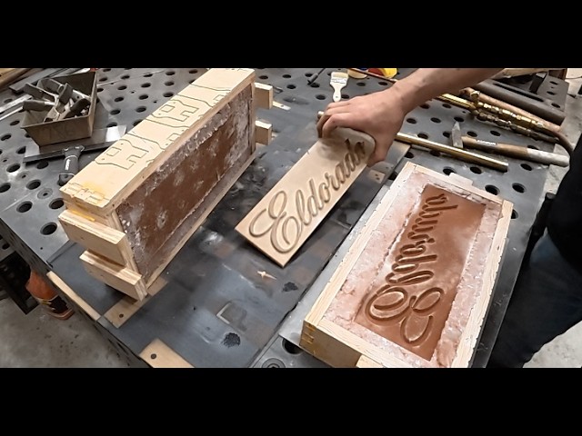 Man flattening wood on a woodworking machine