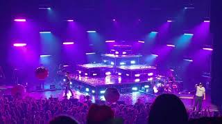 Throwing out beach balls into the crowd.  Big Time Rush Forever Tour Cincinnati, Ohio