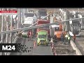 Мачта освещения упала на проезжую часть на Строгинском мосту - Москва 24