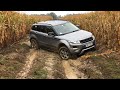 Duster and Evoque in the wet