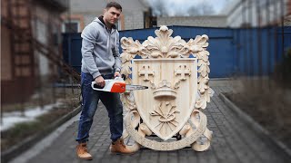 : Wood carving. Coat of arms. Carved crest made of linden (basswood) wood