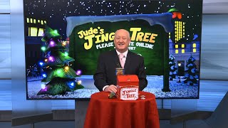 Mike Marshall opens a special SPAM ornament for Jude's Jingle Tree
