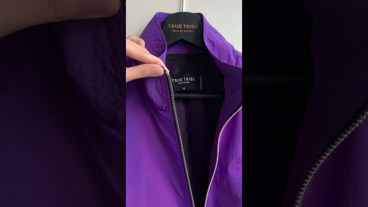 Discover TRUE TRIBE’s “Purple Moon” versatile track jacket. Designed to endure. 