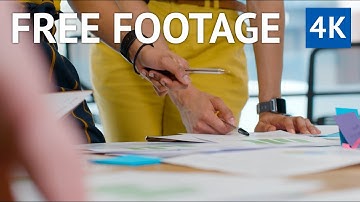 FREE 4k VIDEO - Collaboration is Key! Group of determined startups work together on a project