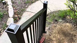 Adding a handrail with premium aluminum components and creating a footing for support
