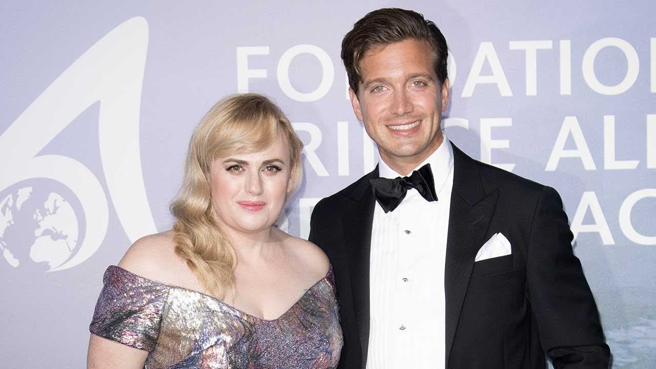 Rebel Wilson poses with shirtless boyfriend Jacob Busch